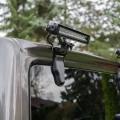 Close-Up of the Rear Window Hinge-Mounted Light Bracket for Jeep Wrangler JL