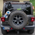 Universal canister mount to spare tire mounting rack  - view of the rear hatch