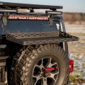 Spare tire storage platform in large size - Gear Storage in a 4x4 Vehicle