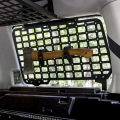 Panel MOLLE Land Rover Discovery 3/4 z zamontowanymi akcesoriami