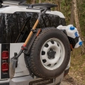 Spare Tire Accessory Mount with a Mounted Shovel