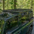 Side view of the Expedition-Gear roof rack mounted on an Ineos Grenadier