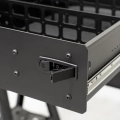 Close-up view of the drawer latch in the Jeep Wrangler JLU overlanding drawer system with a drawer fridge
